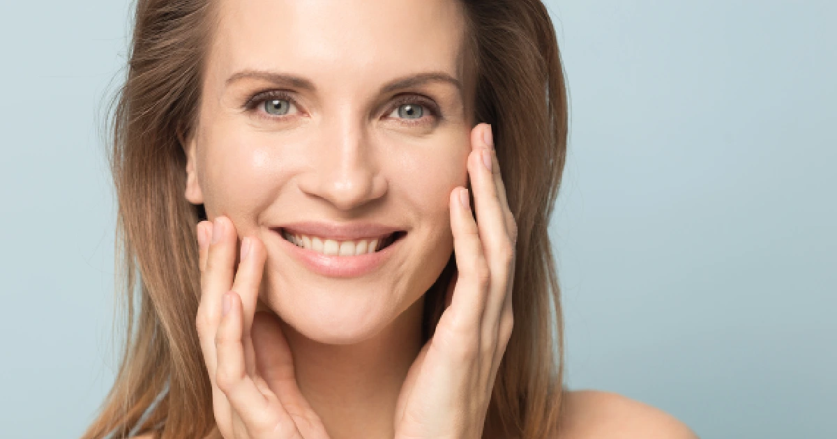 Smiling woman with clear skin results of a Diamond Glow Facial treatment in Morristown, TN