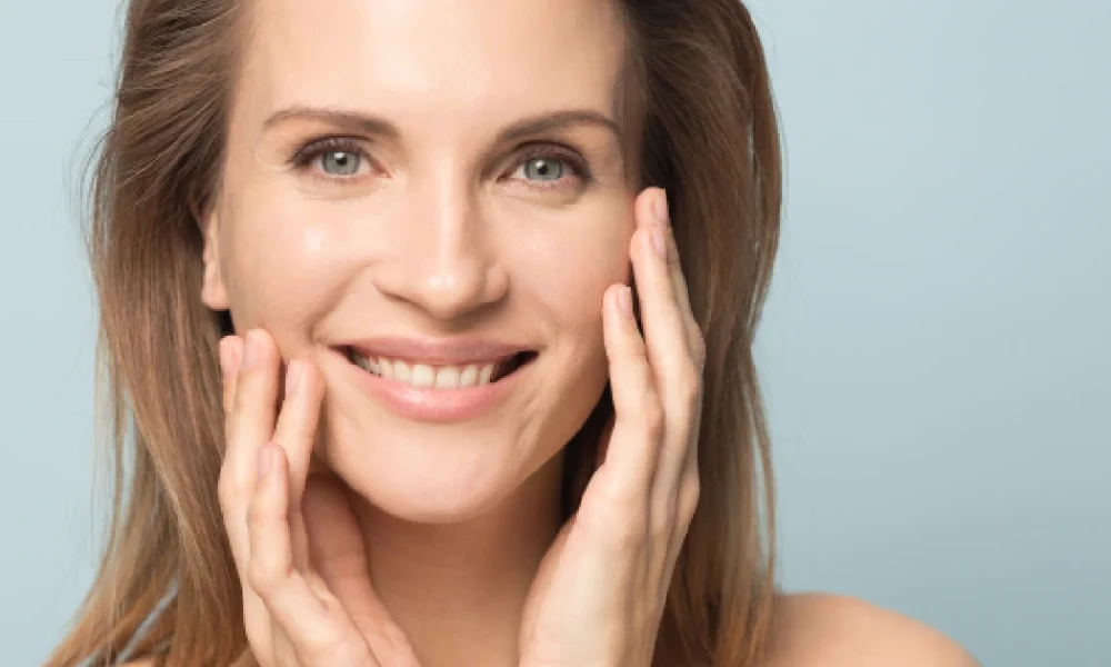 Smiling woman with clear skin results of a Diamond Glow Facial treatment in Morristown, TN